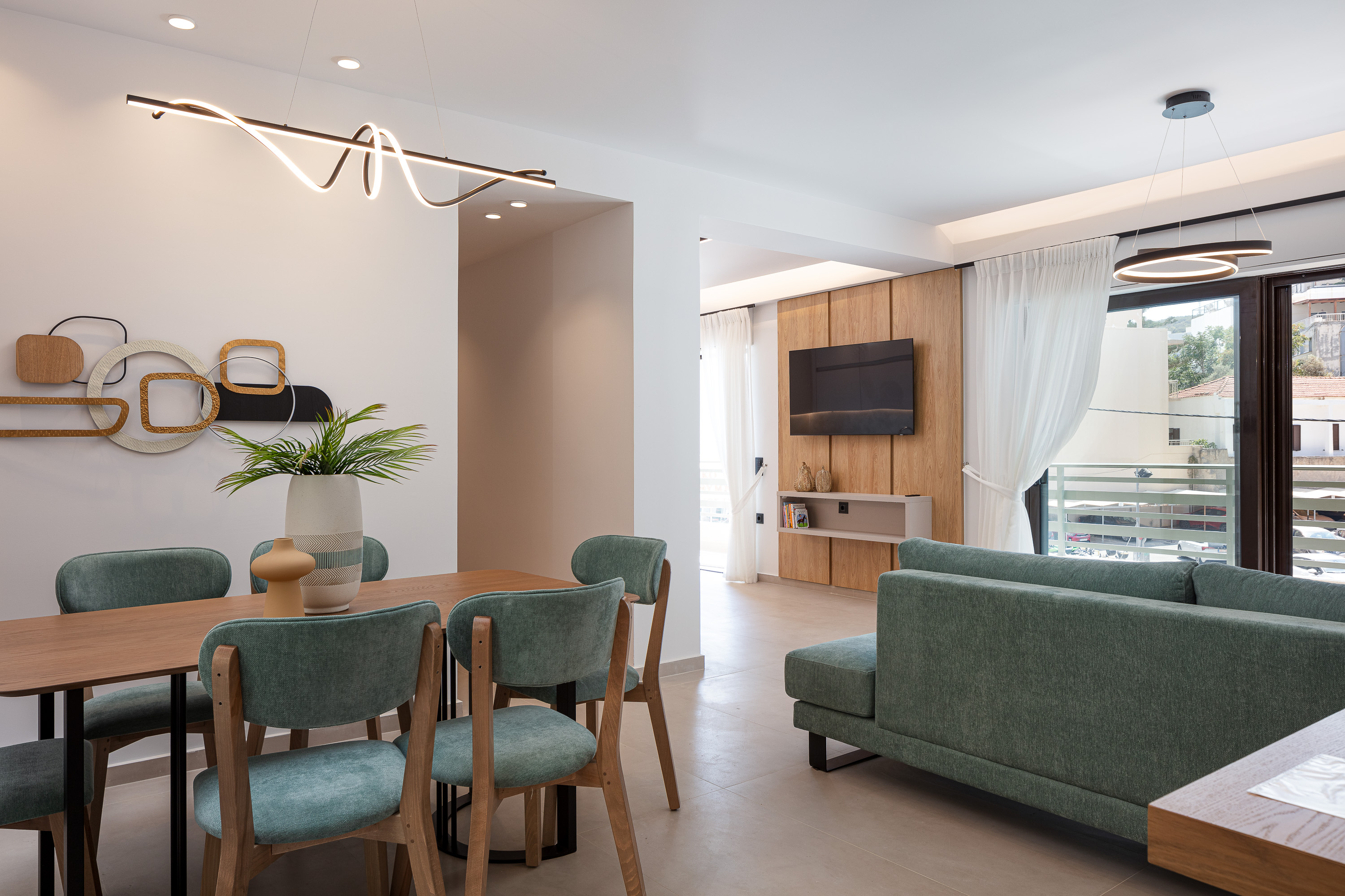 Open plan dining and living area โ holiday apartment Rethymno