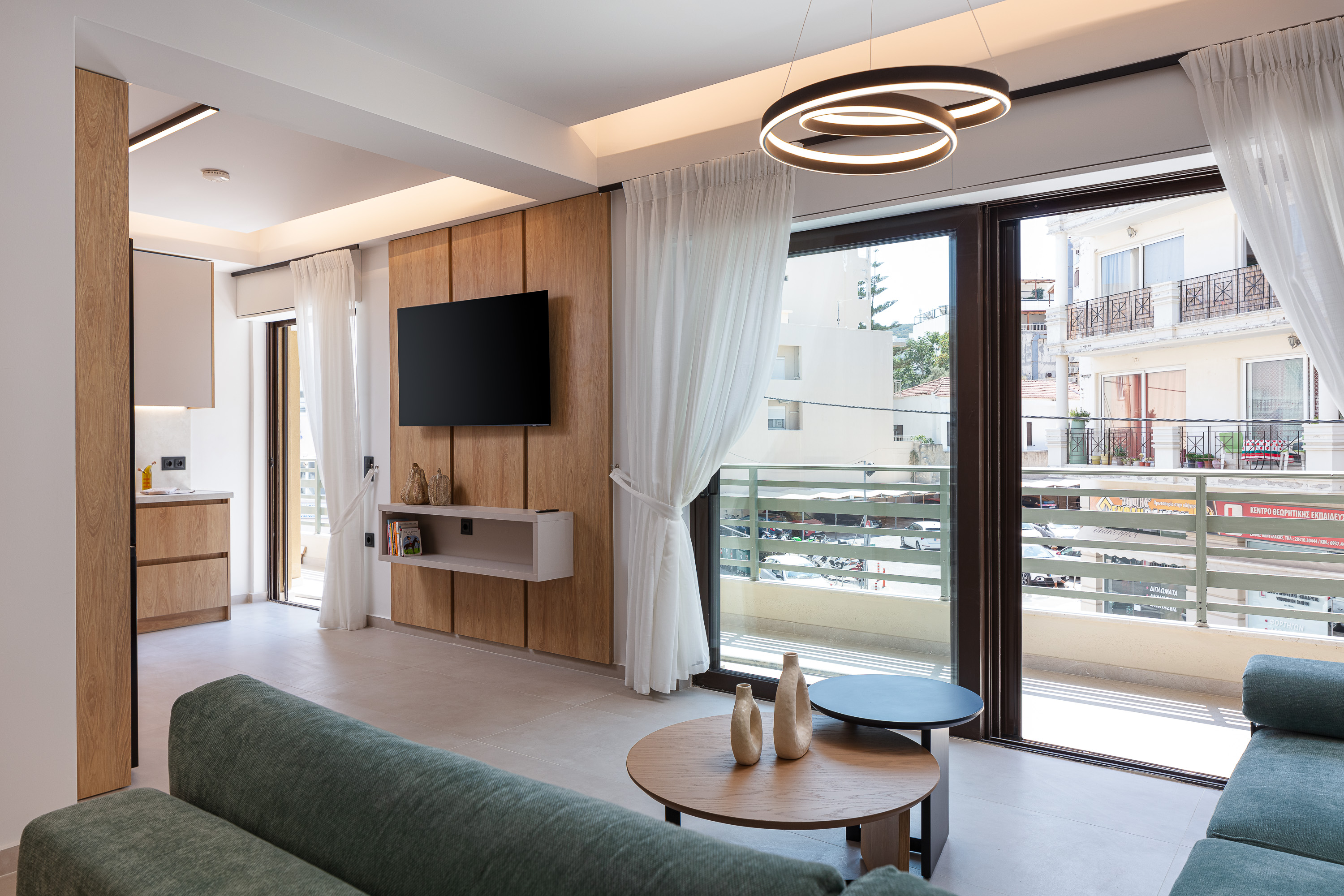 Living area with Smart TV and balcony โ apartment Rethymno Old Town