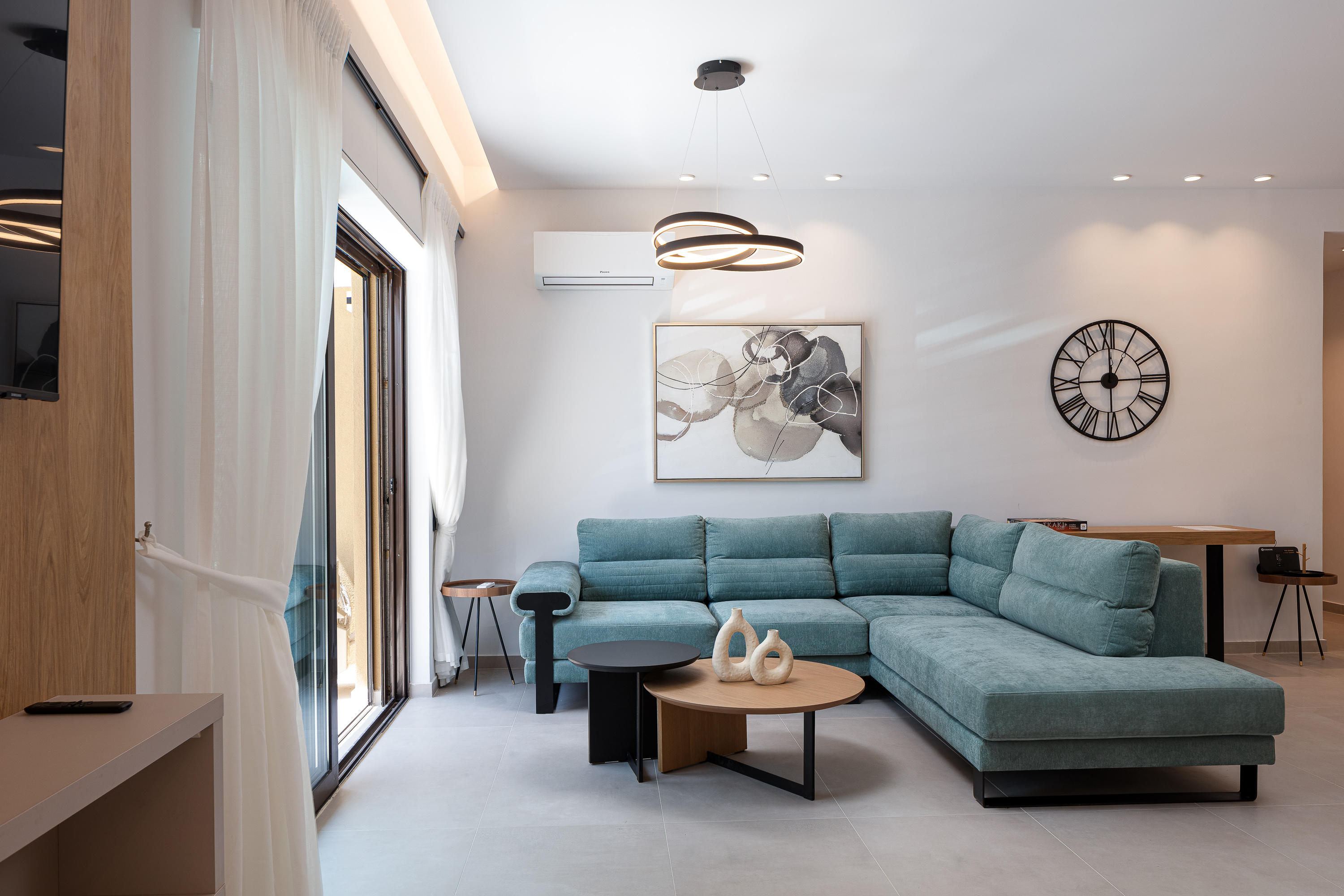 Aria's Apartment Rethymno โ signature living room with designer sofa